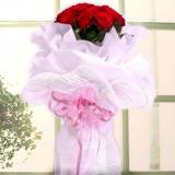 章丘市鲜花店鲜花:红玫瑰19支。粉色棉纸,纱网豪华外包装