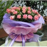 鲜花:7枝紫色玫瑰，1枝多 头百合，手揉纸单面包装（此花需提前预定，并限送各大城市）