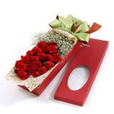 鲜花:红玫瑰99枝，满天星，卷边纸包装