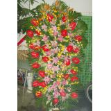 花篮:花材：百合，扶朗花，泰国兰，玫瑰，红掌，剑兰，大鸟等高档开业篮一个，高1.8米